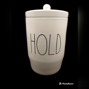 Rae Dunn ceramic canister - reads: HOLD and is color: White